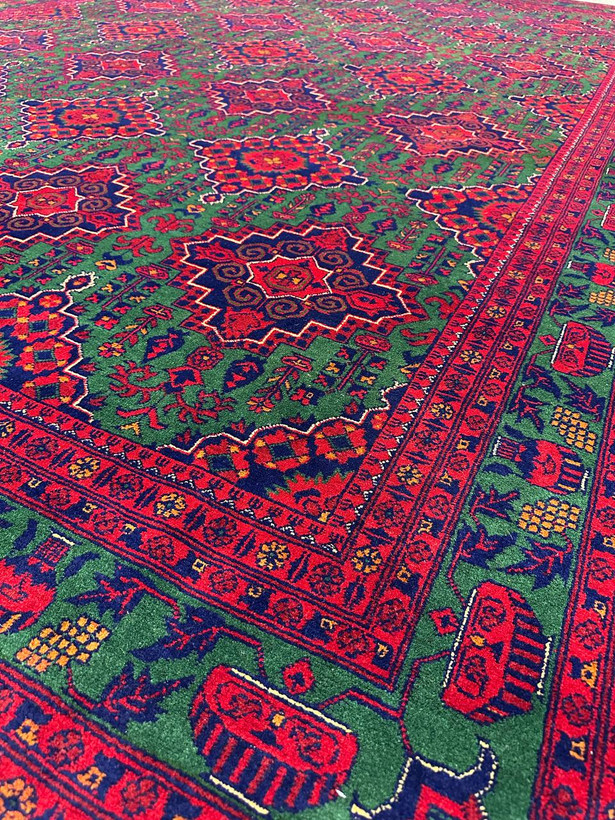 فرش دستبافت 9متری تمام کرک مرینوس زمینه سبز 40رج عشایری رنگ گیاهی کد0400038