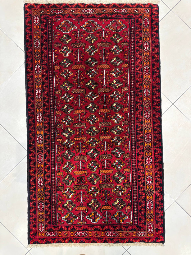 فرش دستبافت 1/5 متری تمام پشم بلوچ نقش گل ترکمن رنگ گیاهی کد0700690