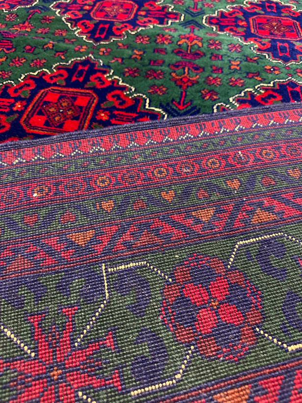 فرش دستبافت 9متری تمام کرک زمینه سبز نقش خامیاب رنگ گیاهی کد0400065